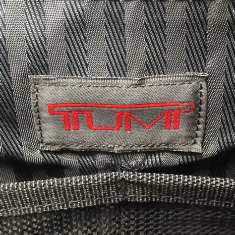 how to tell if tumi bag is fake|authentic tumi bag.